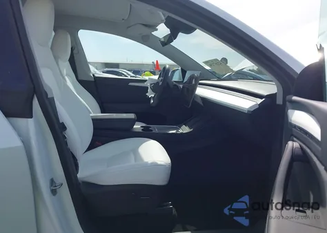 2023 Tesla Model Y Awd/Long Range Dual Motor All-Wheel Drive from USA, damaged, VIN 7SAYGDEE3PA166177